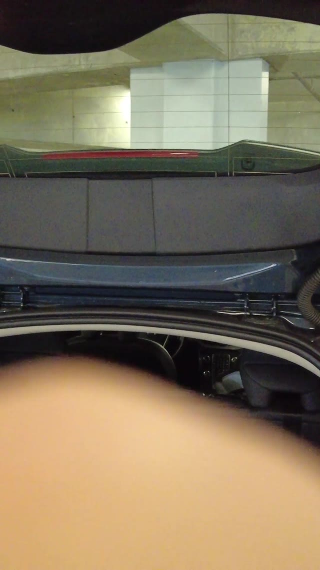 opening car trunk · indoor parking garage