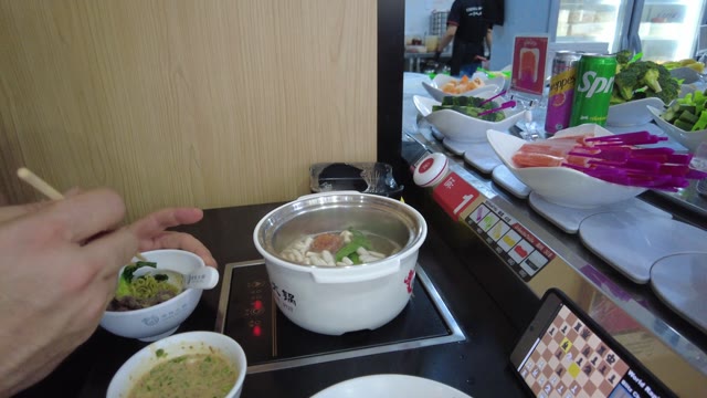 eating hot pot · restaurant