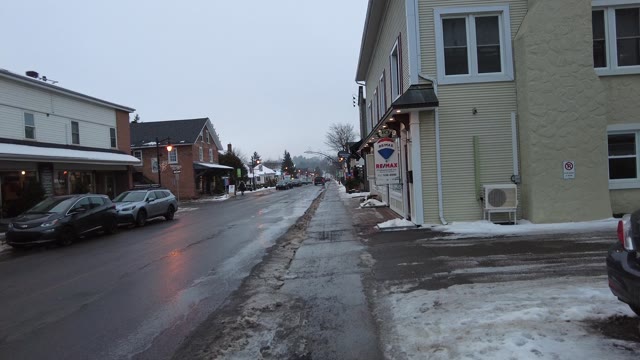 walking down street · small town street